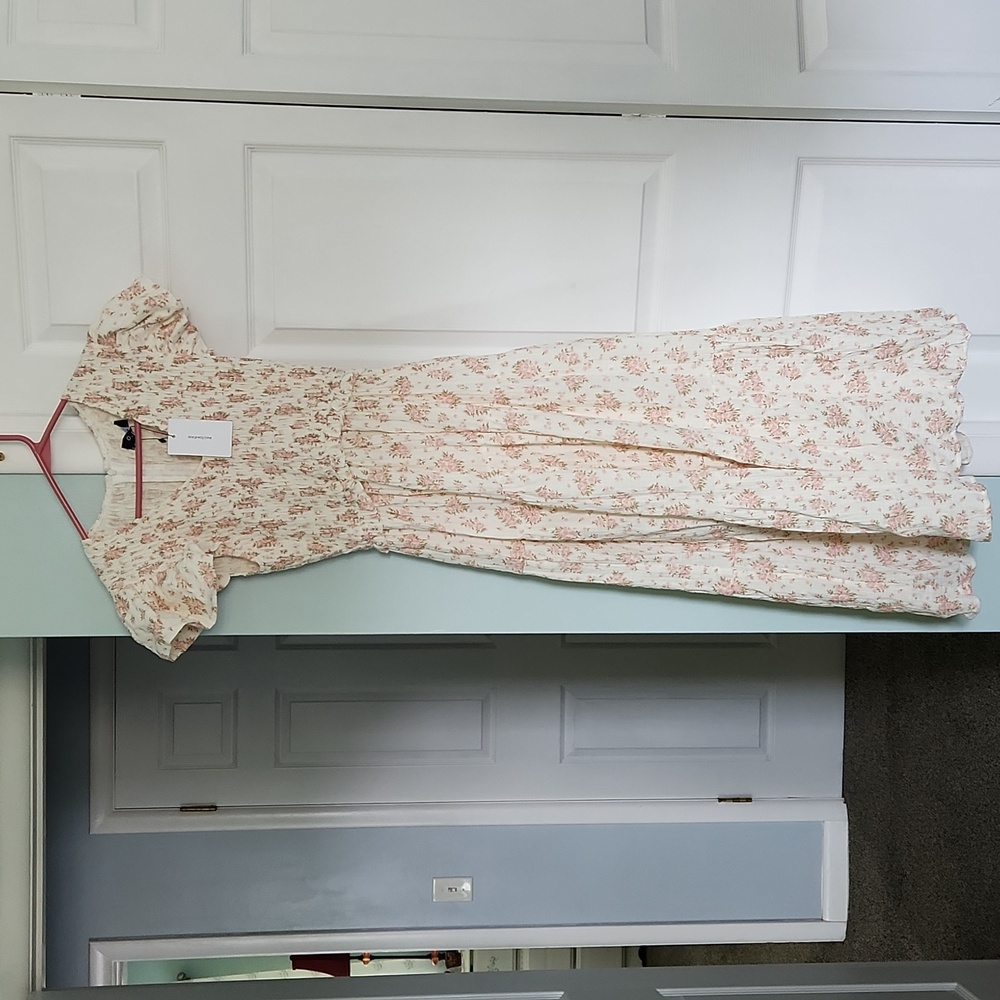 Never wore...long cotton and lined dress. Beautiful dress a bit thicker weight.